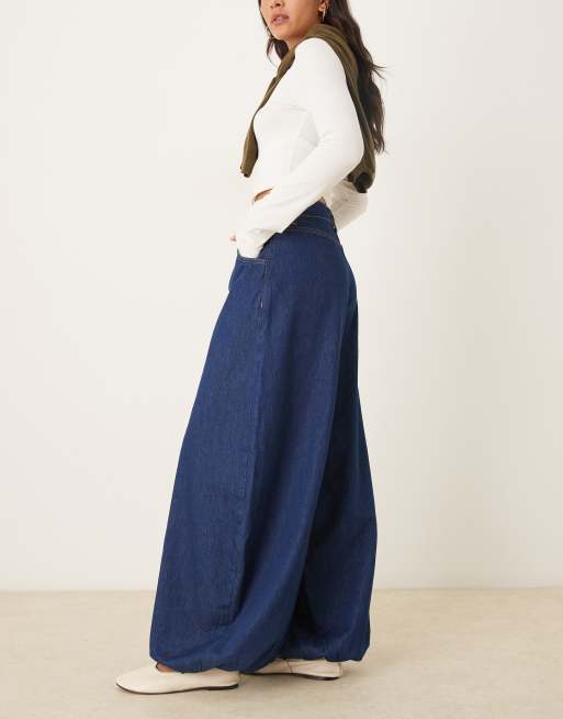 ASOS DESIGN bubble hem jeans in mid blue, 2 of 5