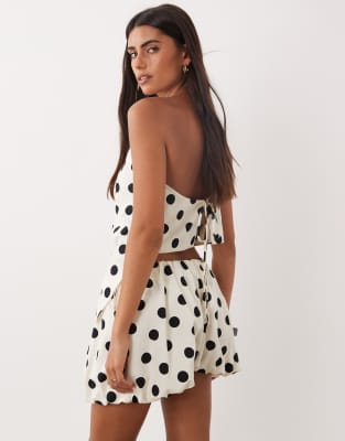 ASOS DESIGN bubble hem side tie shorts in polka dot - part of a