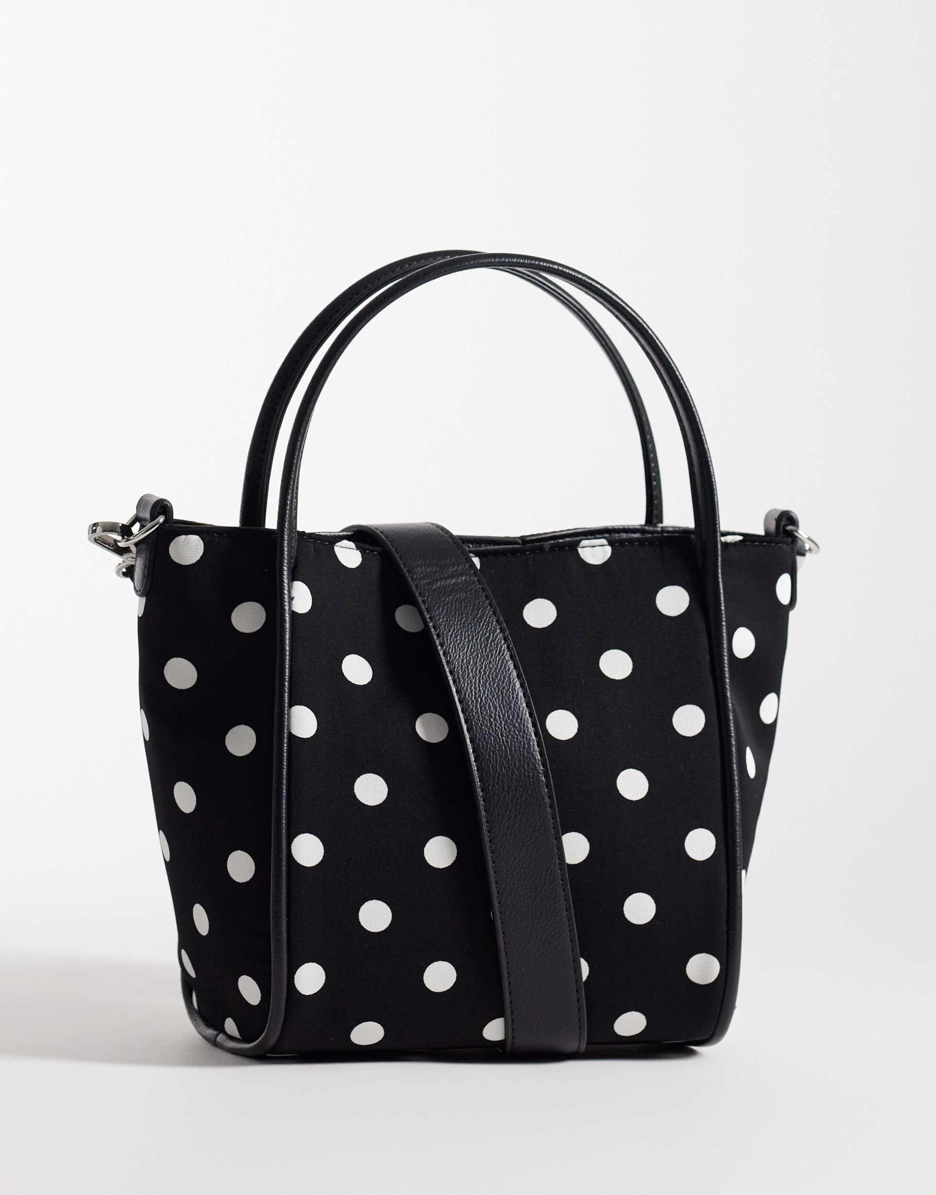 asos design bucket bag with adjustable cross body strap in mono polka dot