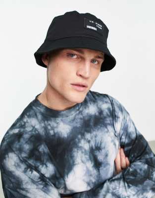 Asos Design Bucket Hat In Black Cotton With Branded Logo