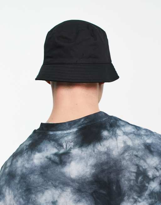 ASOS DESIGN bucket hat in black cotton with branded logo | ASOS