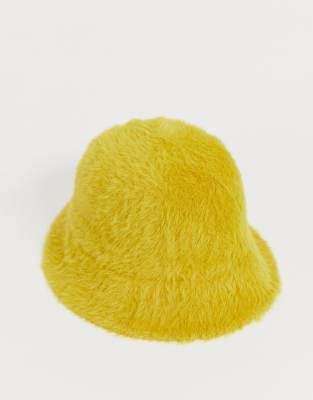 yellow fur hat