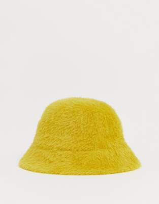 yellow fur hat