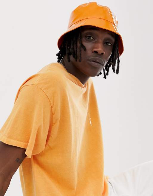 ASOS DESIGN bucket hat in shiny orange plastic | ASOS