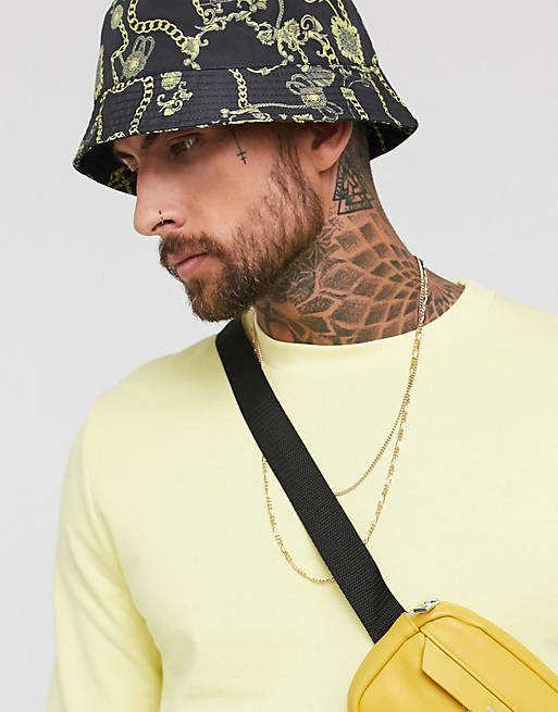ASOS DESIGN bucket hat with gold chain print | ASOS