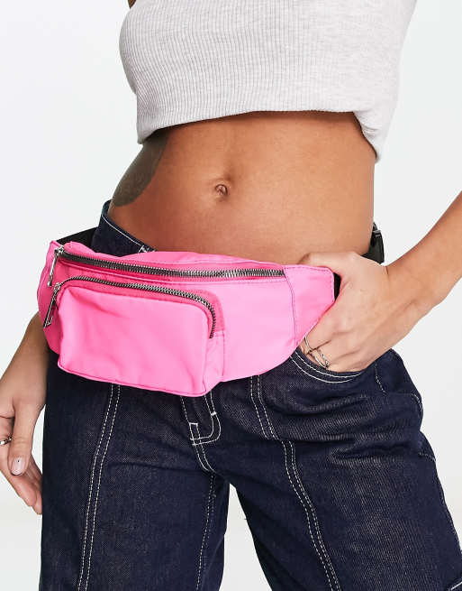 ASOS DESIGN bum bag with front pocket in pink