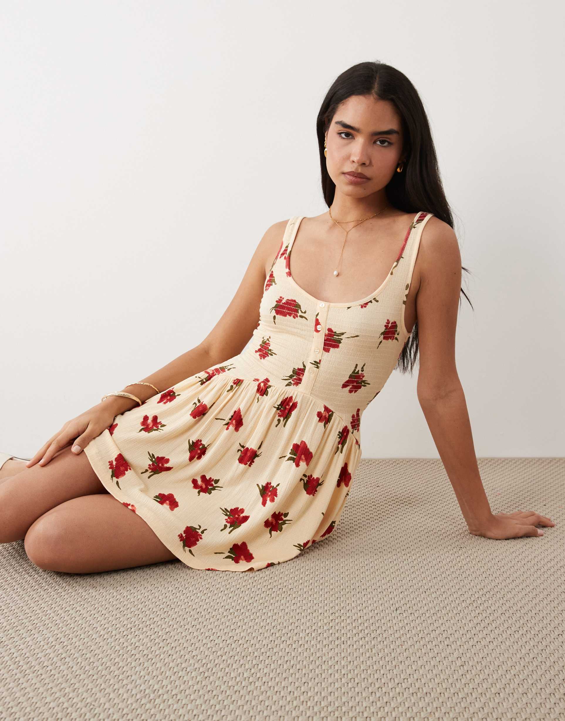 asos design button crinkle mini dress in yellow & red floral print