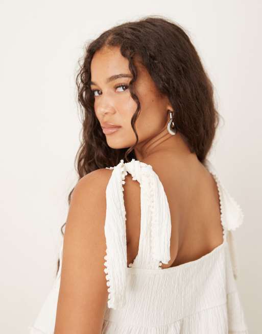 ASOS DESIGN button down tie strap cami top with heart detail
