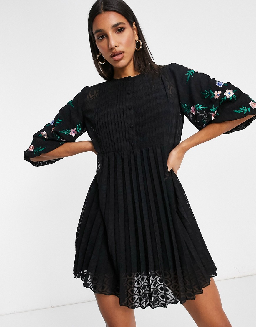 ASOS DESIGN button front embroidered pleated dobby mini smock dress in black