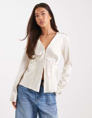 ASOS DESIGN button front long sleeve satin top in champagne-White
