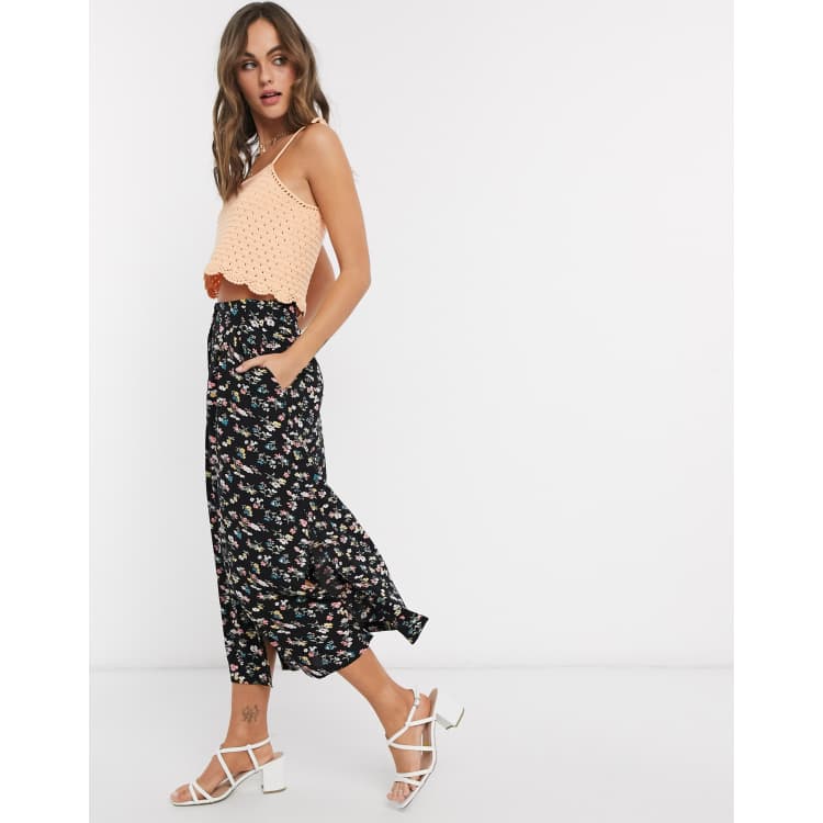 ASOS DESIGN button front midi skirt in black floral print ASOS