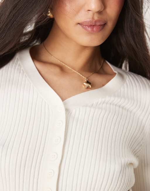 ASOS DESIGN button front v neck cardigan with frill in rib in cream