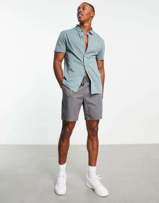 ASOS DESIGN button through jersey shirt in washed blue | ASOS