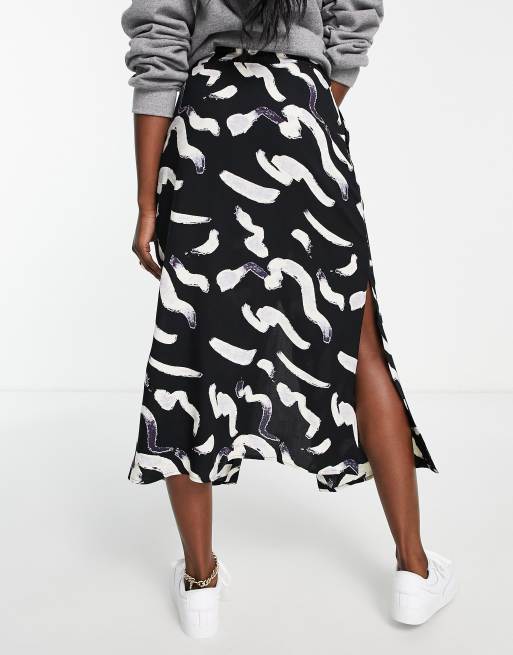 ASOS DESIGN button through midi skirt in mono smudge print ASOS