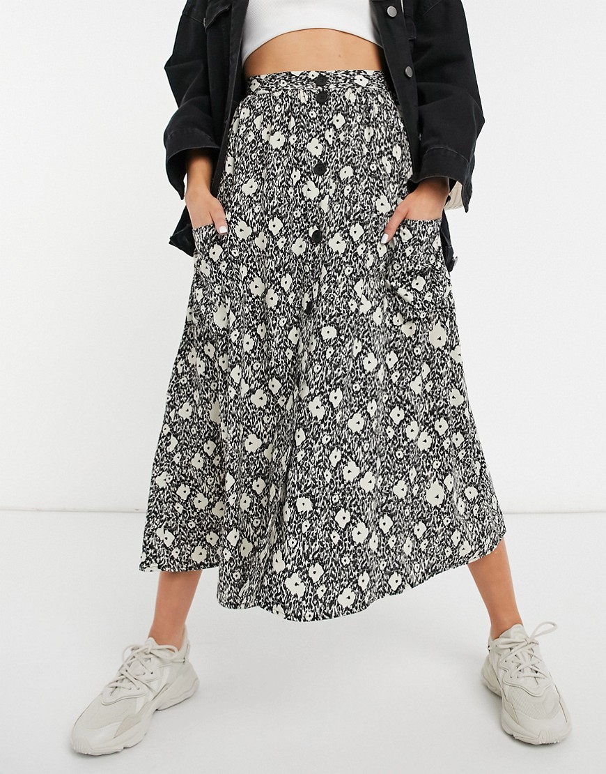 ASOS DESIGN button through midi skirt with deep pocket detail in blurred floral print-Multi