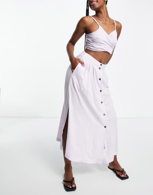 ASOS DESIGN button through midi skirt with deep pocket detail in lilac