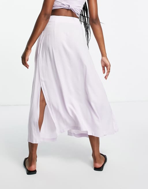 ASOS DESIGN button through midi skirt with deep pocket detail in lilac ASOS