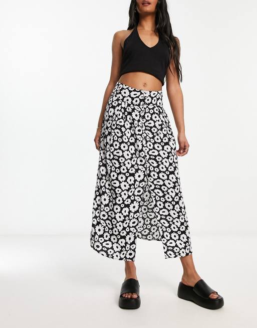 ASOS DESIGN button through midi skirt with split in mono daisy print ASOS