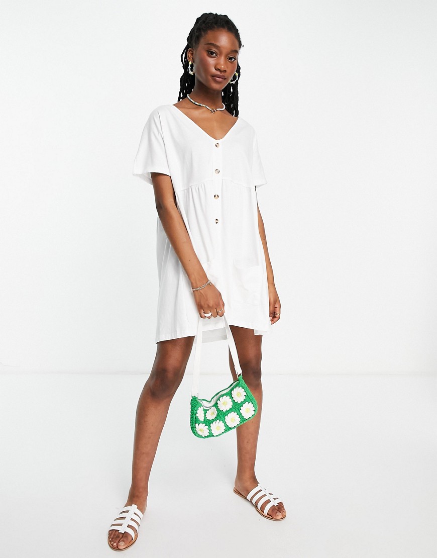 ASOS DESIGN button through mini smock dress with pockets in white