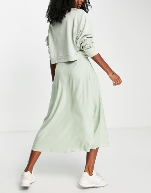 ASOS DESIGN button through pocket midi skirt with in sage green