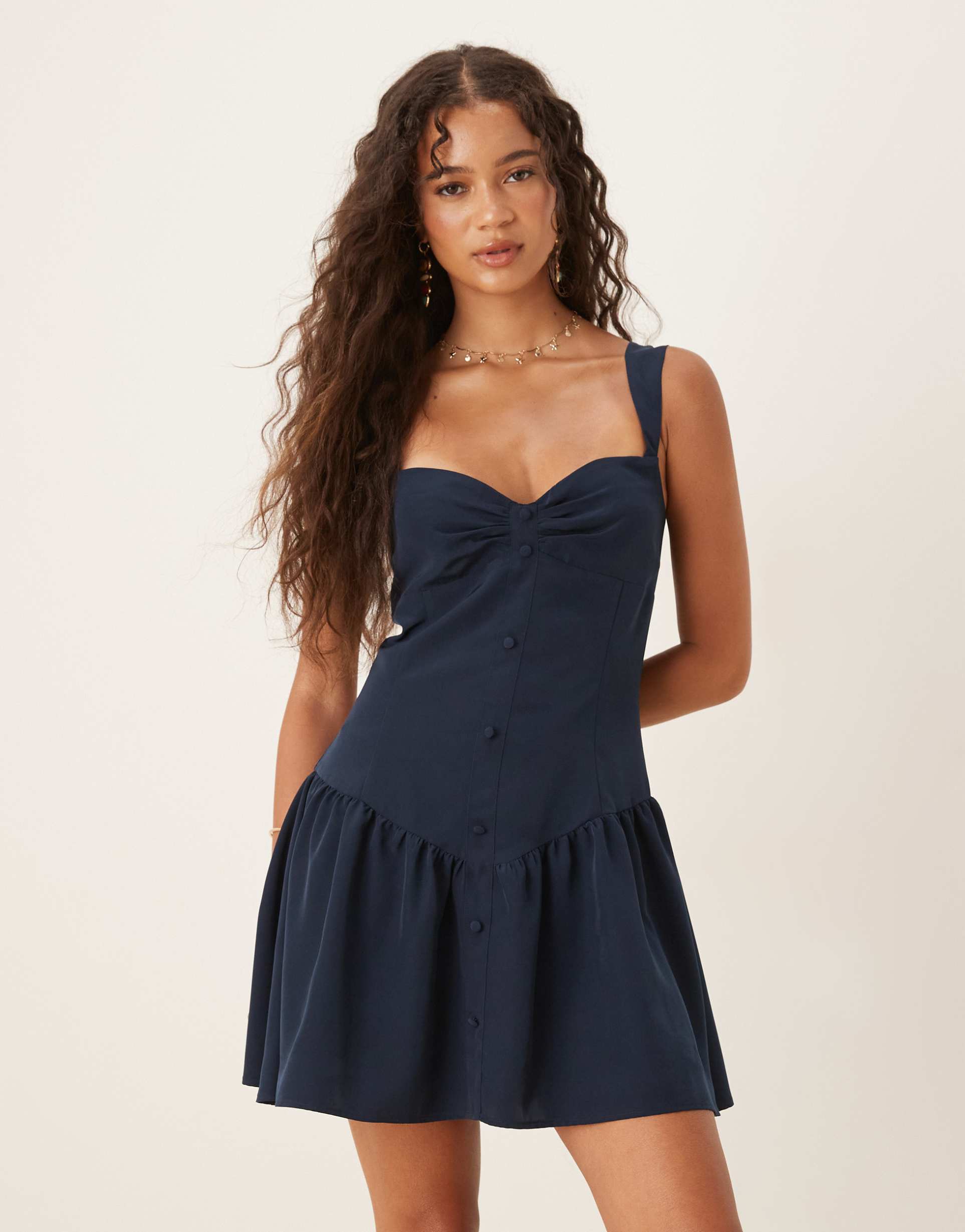 asos design button through satin slip mini dress in navy