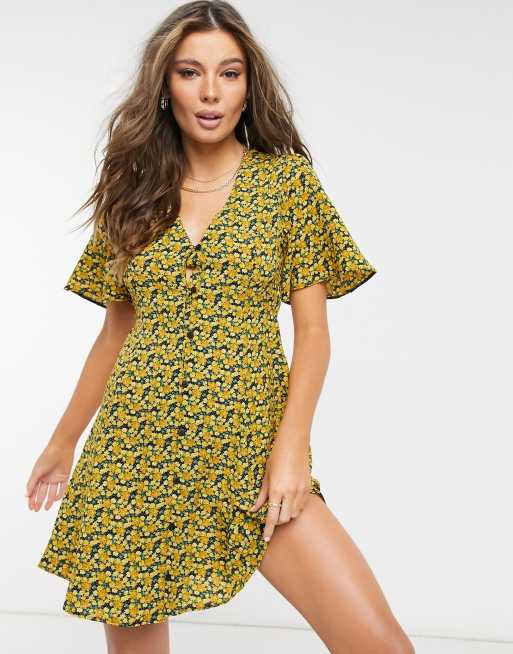 ASOS DESIGN button through tie back mini tea dress with angel sleeve in yellow floral print