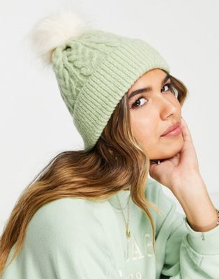 ASOS DESIGN cable knit beanie with faux fur pom in sage