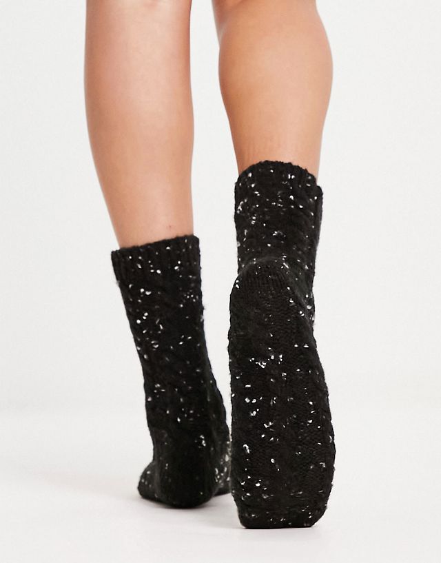 ASOS DESIGN cable knit lounge socks in black neppy CE7535