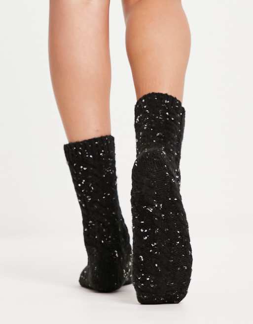 ASOS DESIGN cable knit lounge socks in black neppy