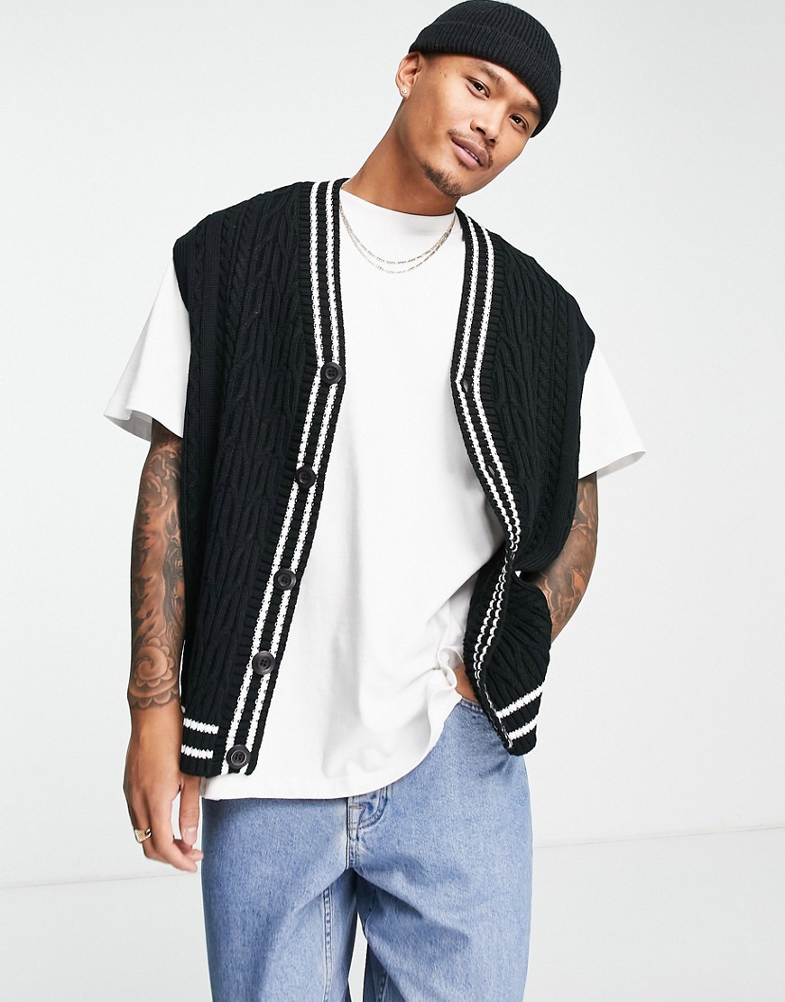 ASOS DESIGN cable knit sleeveless cricket sweater vest in black