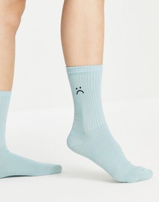 ASOS DESIGN rib socks with face embroidery in sage