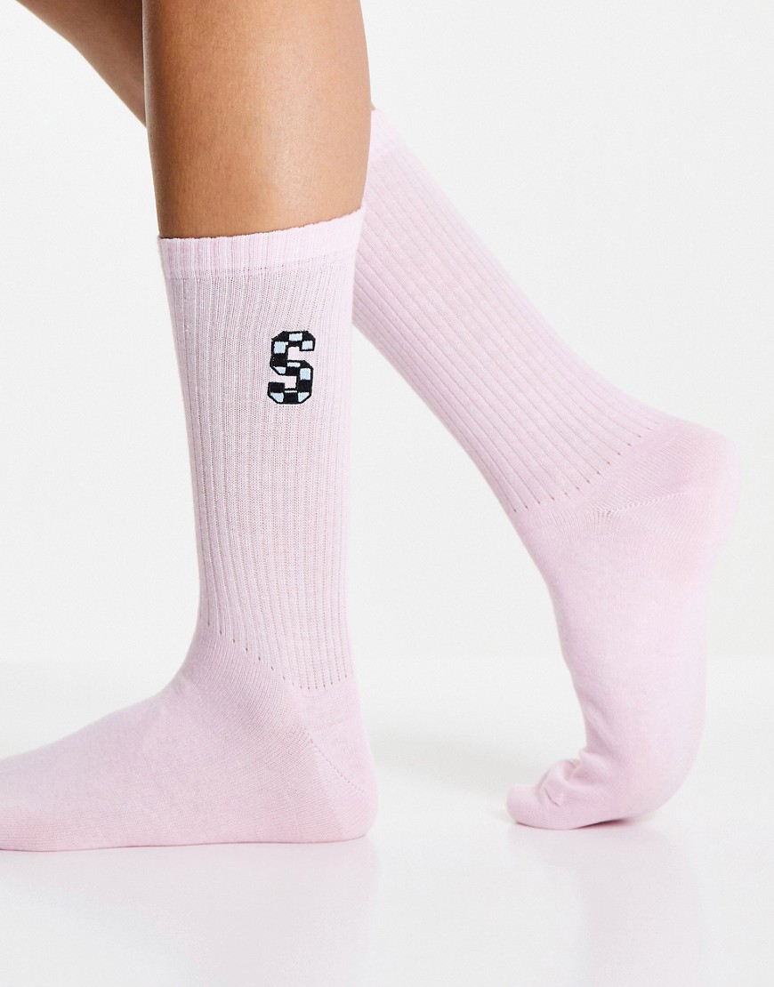 ASOS DESIGN calf length rib socks with S initial in pink