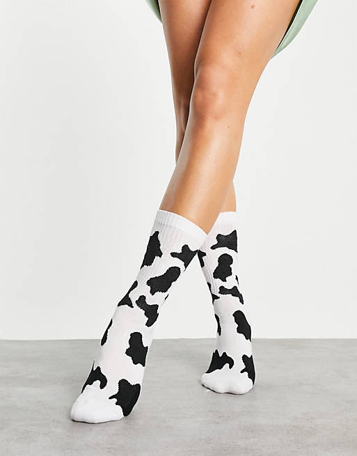 ASOS DESIGN calf length rib sport sock in cow print