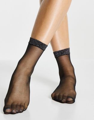 ASOS DESIGN calf length sheer socks in glitter welt in black