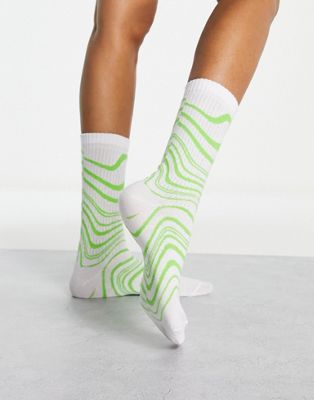 ASOS DESIGN socks with swirl print in green