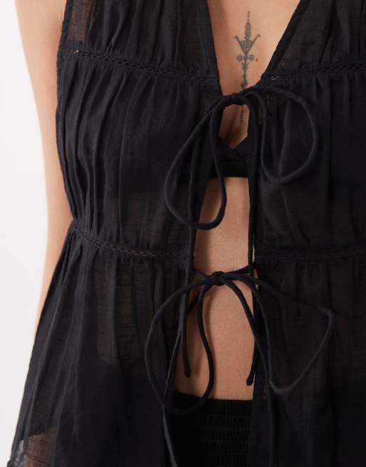ASOS DESIGN Calypso tie front beach vest with lace cut out trim in black, 4 of 4