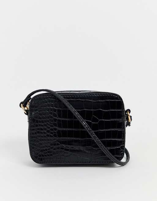 ASOS DESIGN - Camera bag con tracolla effetto serpente