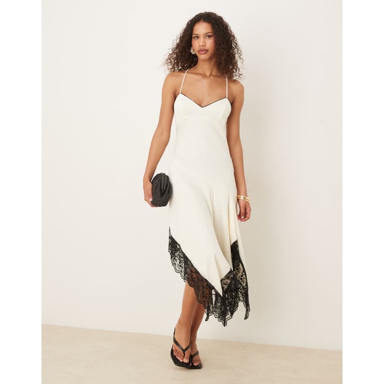 ASOS DESIGN cami cream slip dress with black contrast lace and hanky hem |  ASOS