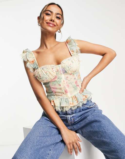 ASOS DESIGN - Cami met korsetbuste en kanten zoom in zachte bloemenprint