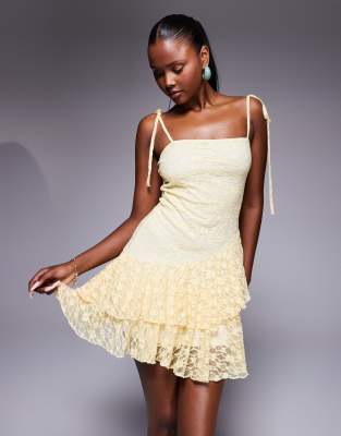 Asos Design Cami Mini Dress With Loose Straps And Asymmetric Ruffle Hem In Yellow