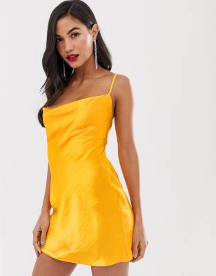 ASOS DESIGN cami mini slip dress in high shine satin with lace up back-Orange