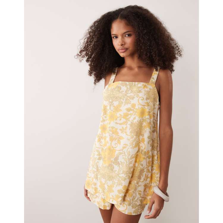 ASOS DESIGN cami romper in yellow floral print | ASOS