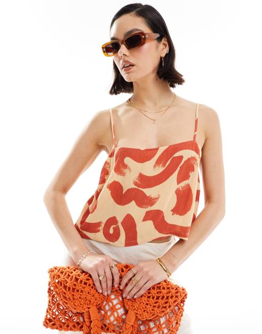 ASOS DESIGN - Cami van kreukelstof met linnenlook en vierkante hals in oranje wervelprint