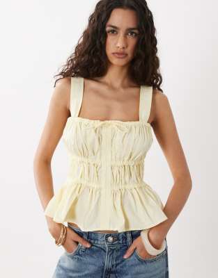 ASOS DESIGN cami with ruched detail and bows in yellow