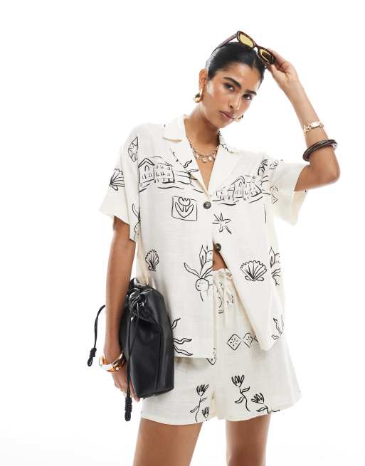 ASOS DESIGN - Camicia a maniche corte in misto lino con stampa di schizzi in coordinato