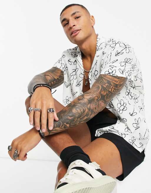 ASOS DESIGN - Camicia comoda con rever in tessuto testurizzato con stampa a fiori