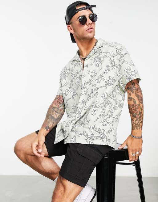 ASOS DESIGN - Camicia comoda effetto lino con stampa a fiori e collo a rever
