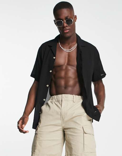 ASOS DESIGN - Camicia comoda in tessuto stropicciato leggero nera