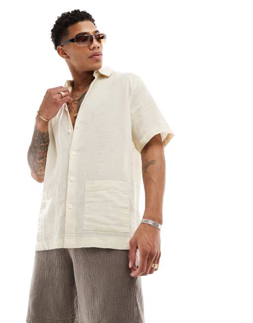 ASOS DESIGN - Camicia comoda testurizzata color sabbia con tasche applicate