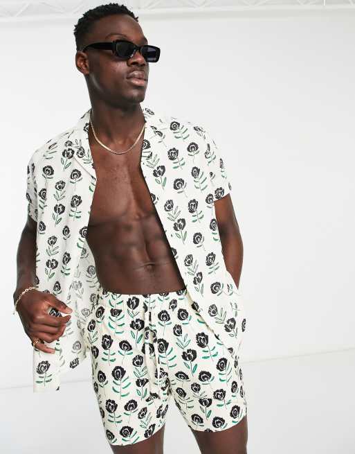ASOS DESIGN - Camicia in misto lino con rever e stampa a fiori in coordinato